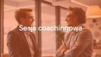 A coach and client talking together in a bright, professional office, focused and engaged, warm and motivational atmosphere, realistic style.