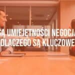 Business professionals shaking hands at a meeting table, negotiation atmosphere, professional setting, realistic.