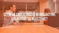 Business professionals shaking hands at a meeting table, negotiation atmosphere, professional setting, realistic.
