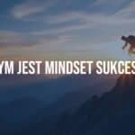 A person climbing a mountain at sunrise, symbolizing success mindset, determination, and personal growth, motivational and inspiring, realistic style.
